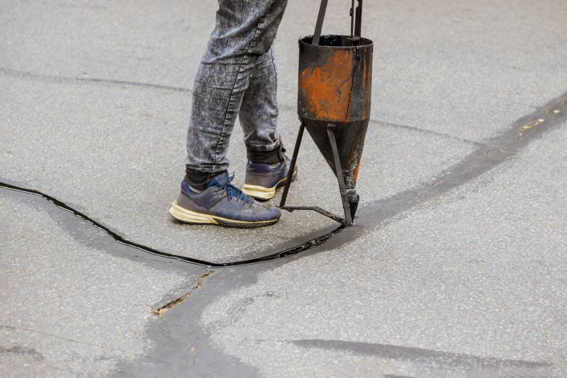 Crack Repair on Asphalt Driveway
